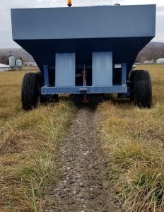 Laying gravel in the pivot tracks